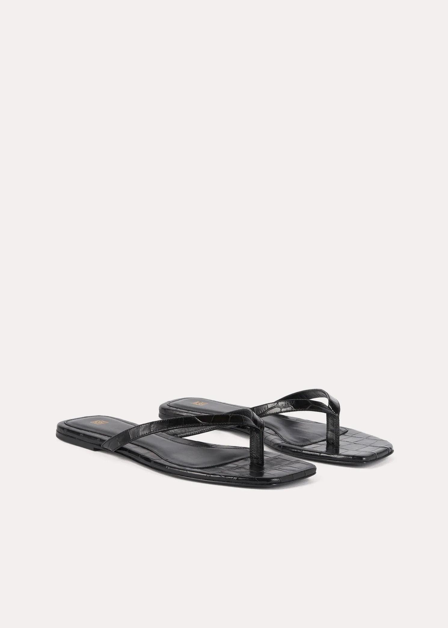 Croco-embossed flip flops black
