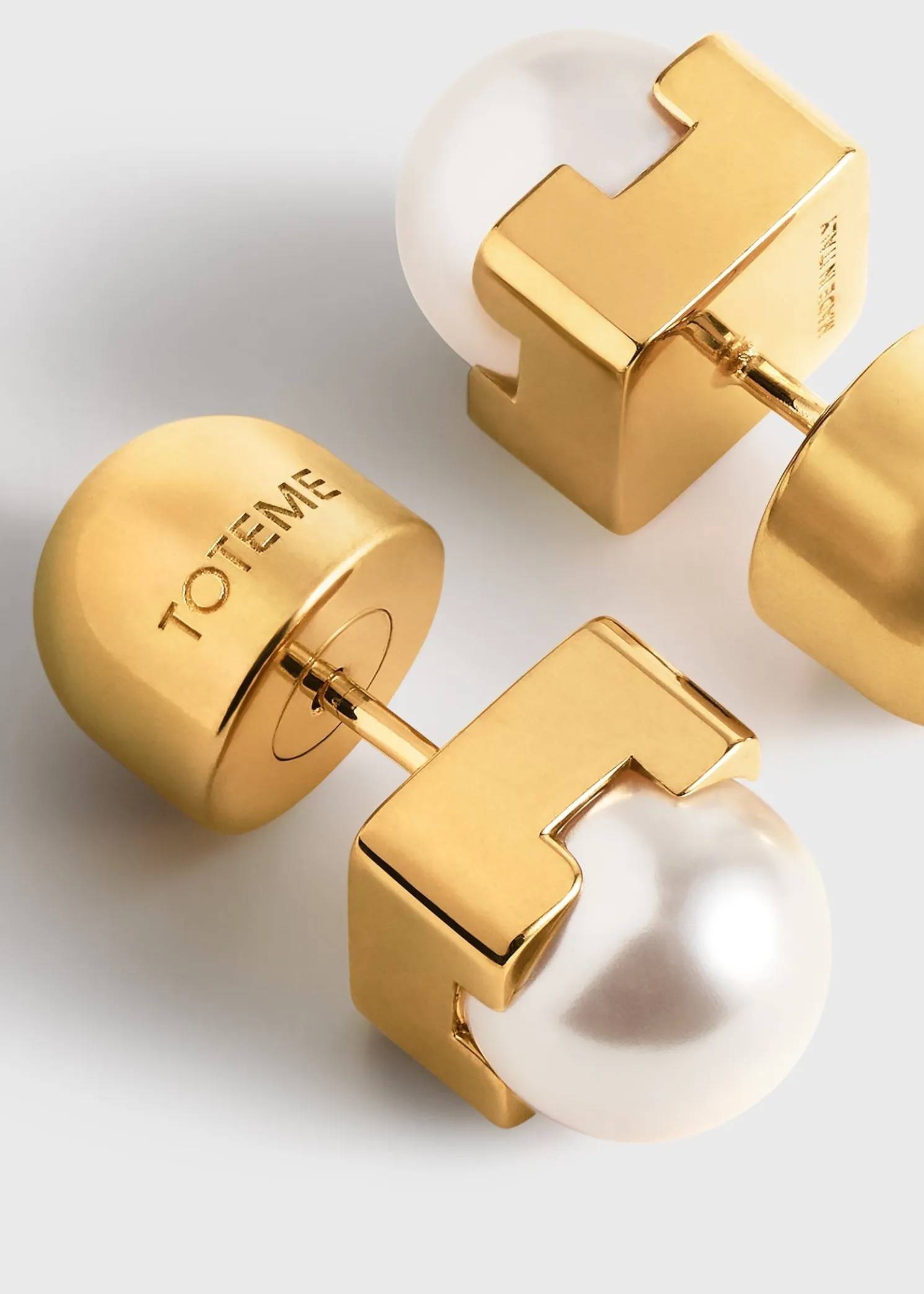 Faux pearl studs white