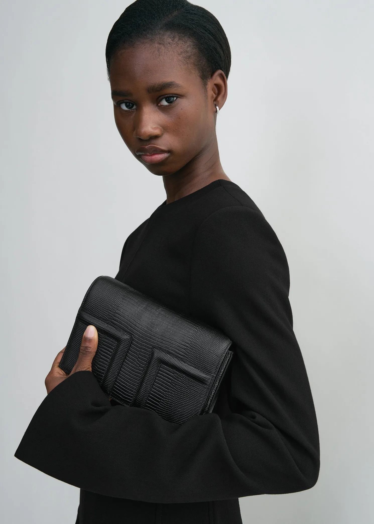 Mini T-Flap lizard-embossed bag black