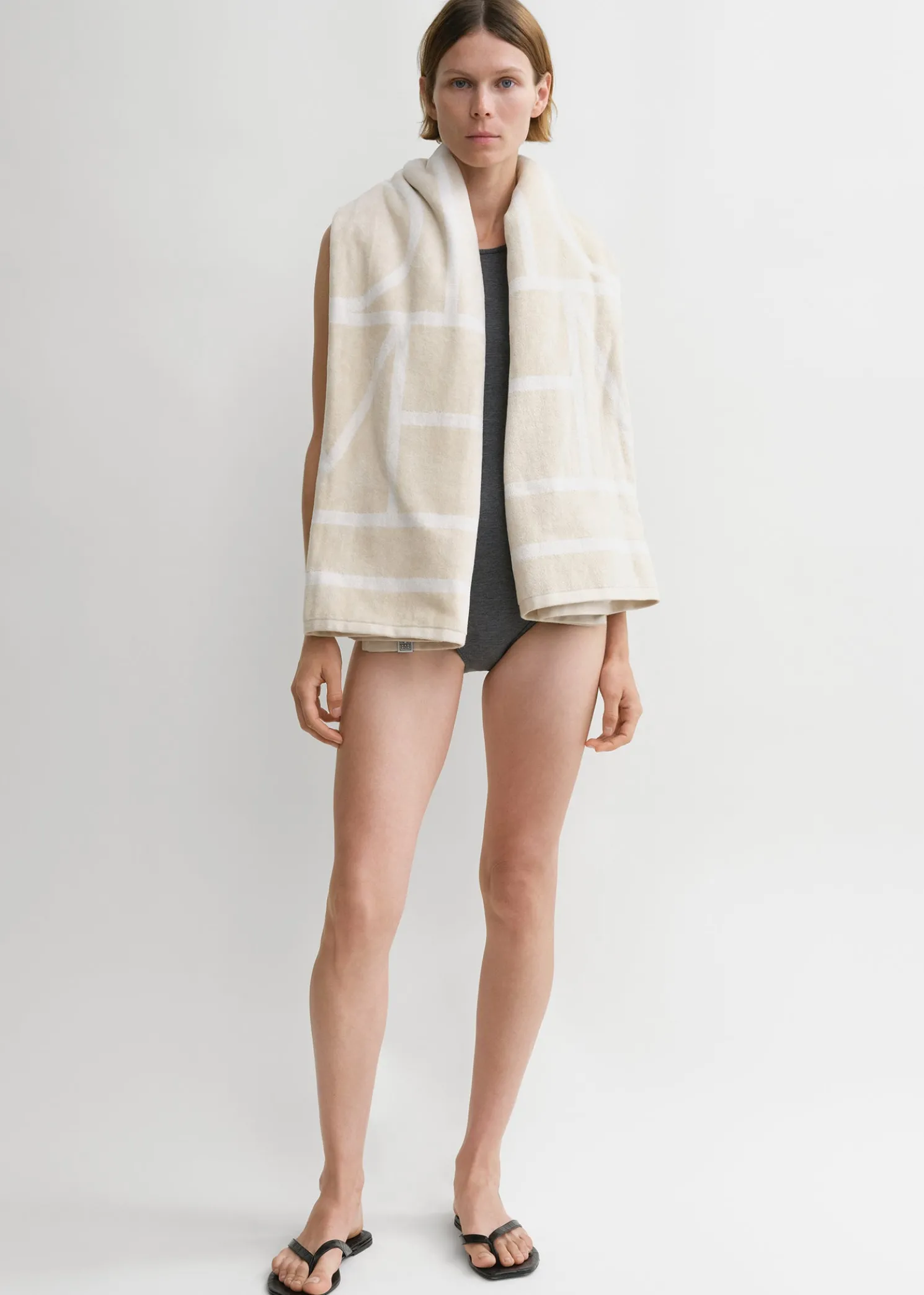 Monogram jacquard beach towel sand