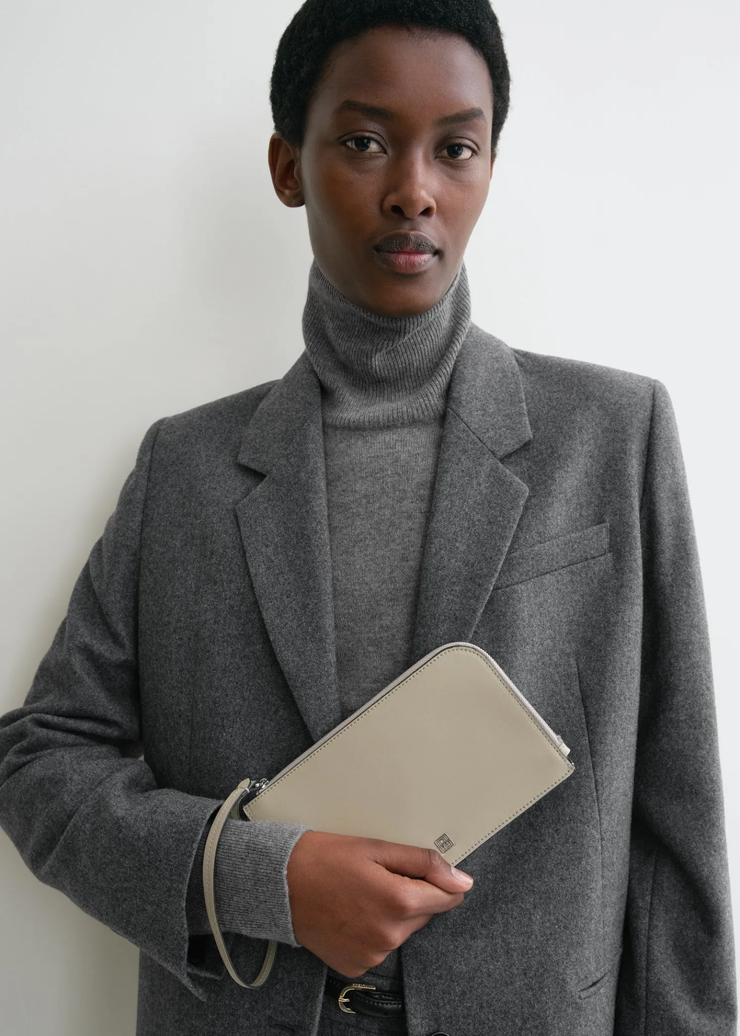 Monogram leather wristlet pouch fawn