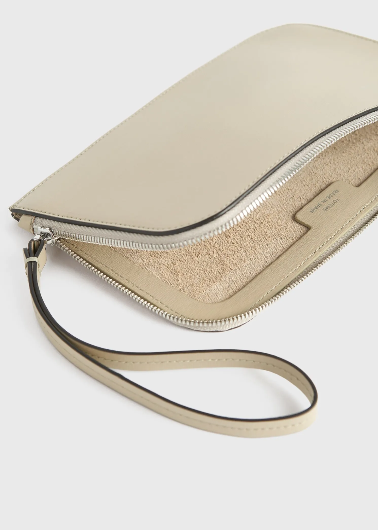 Monogram leather wristlet pouch fawn