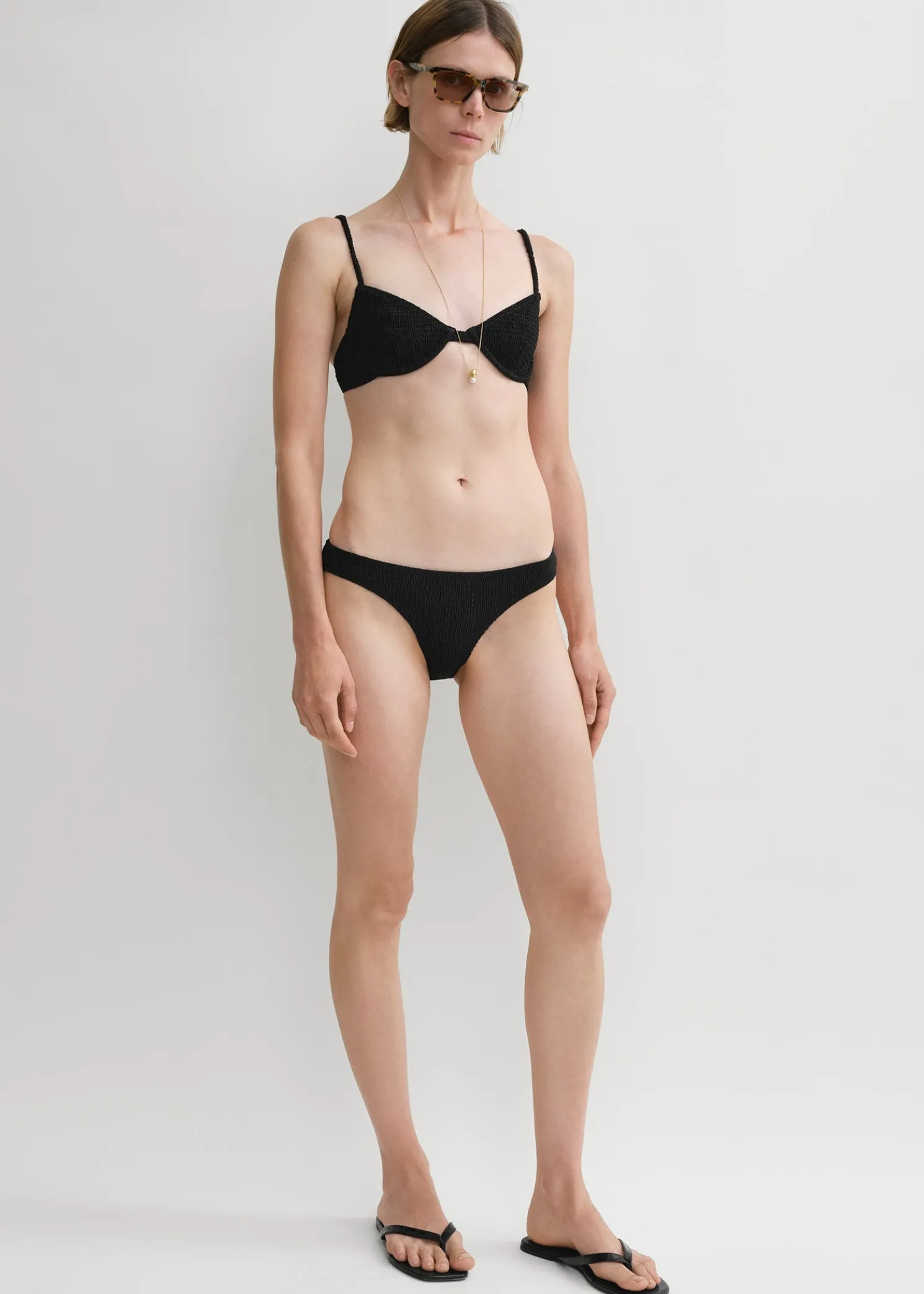 Smocked mid-rise bikini bottoms black