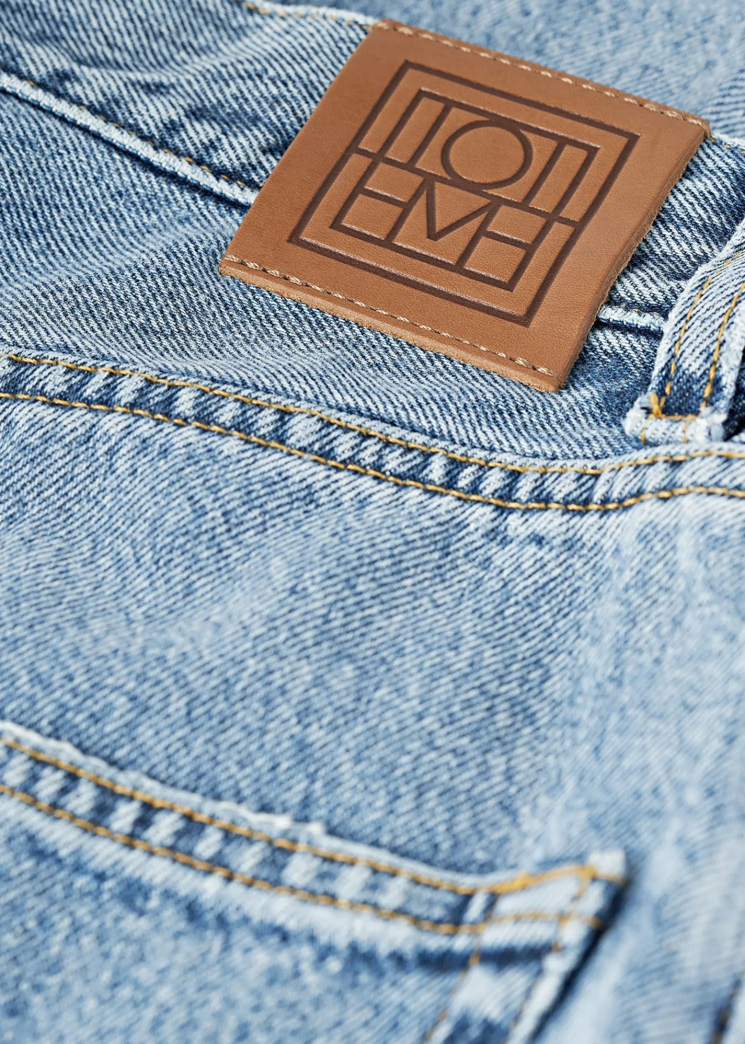 Tapered leg denim worn blue