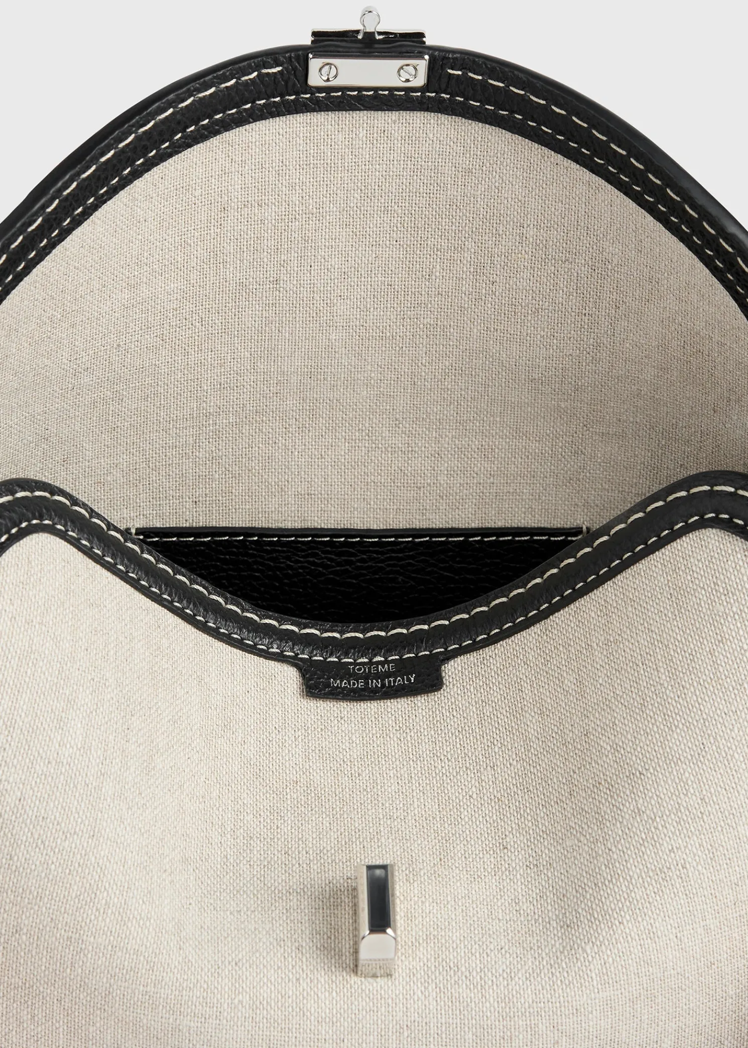 T-Lock canvas clutch ecru/black