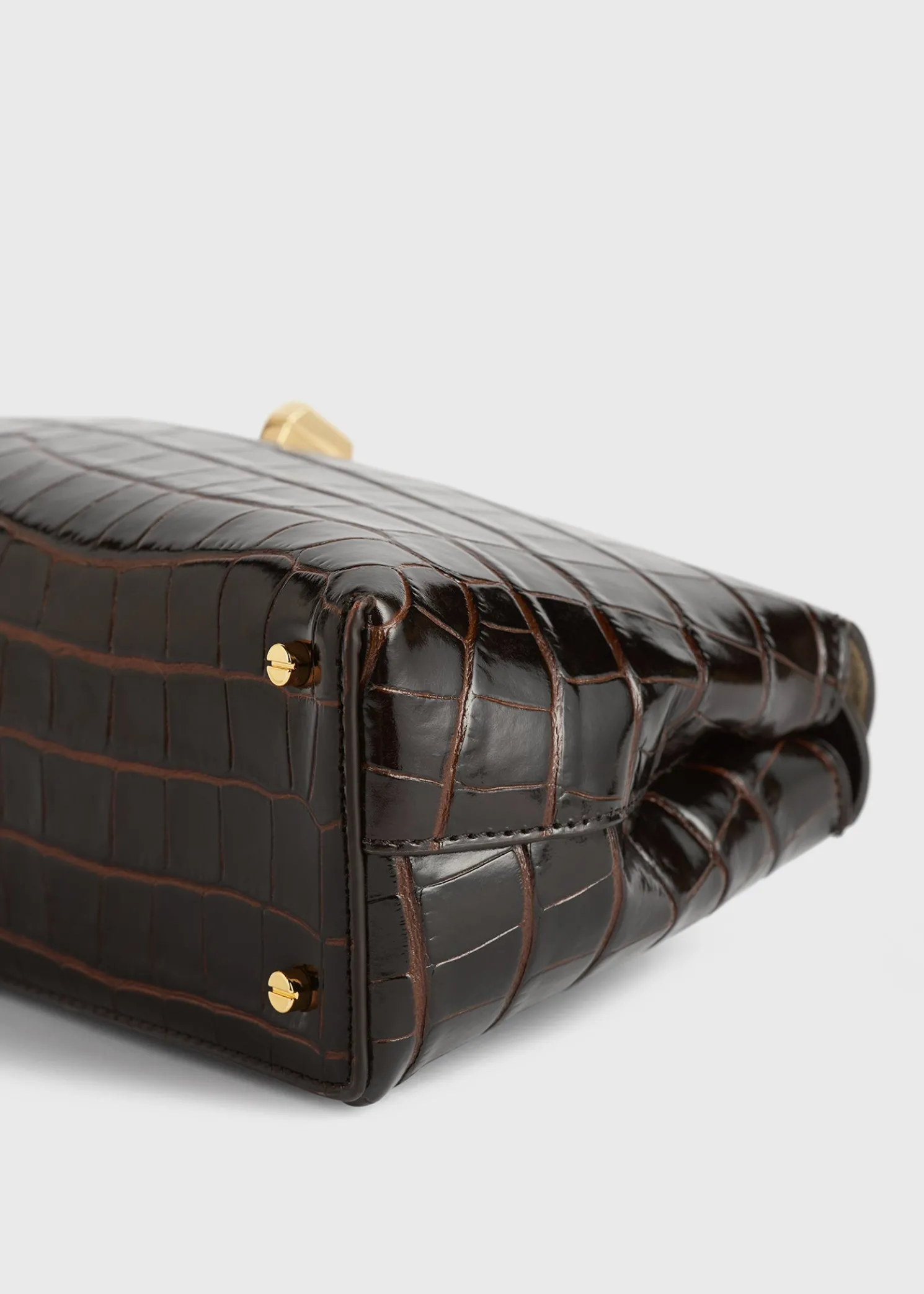 T-Lock croco-embossed clutch dark brown