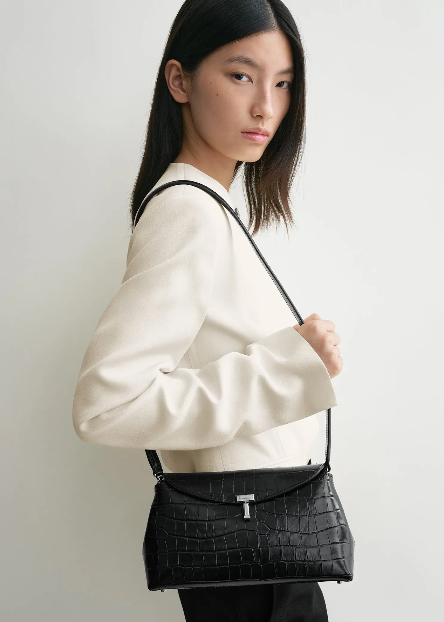 T-Lock croco-embossed clutch black