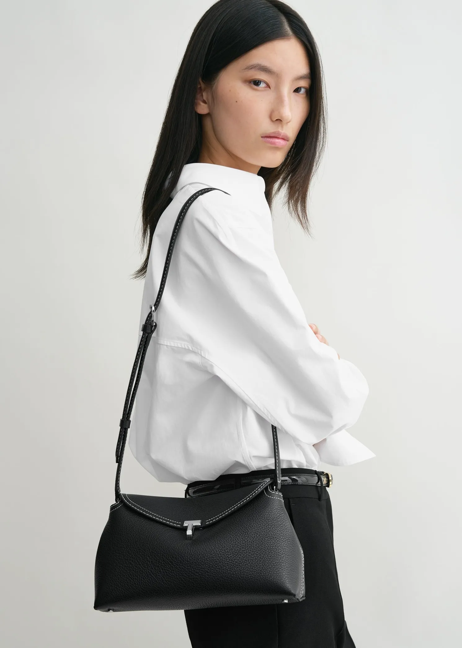 T-Lock grained-leather clutch black