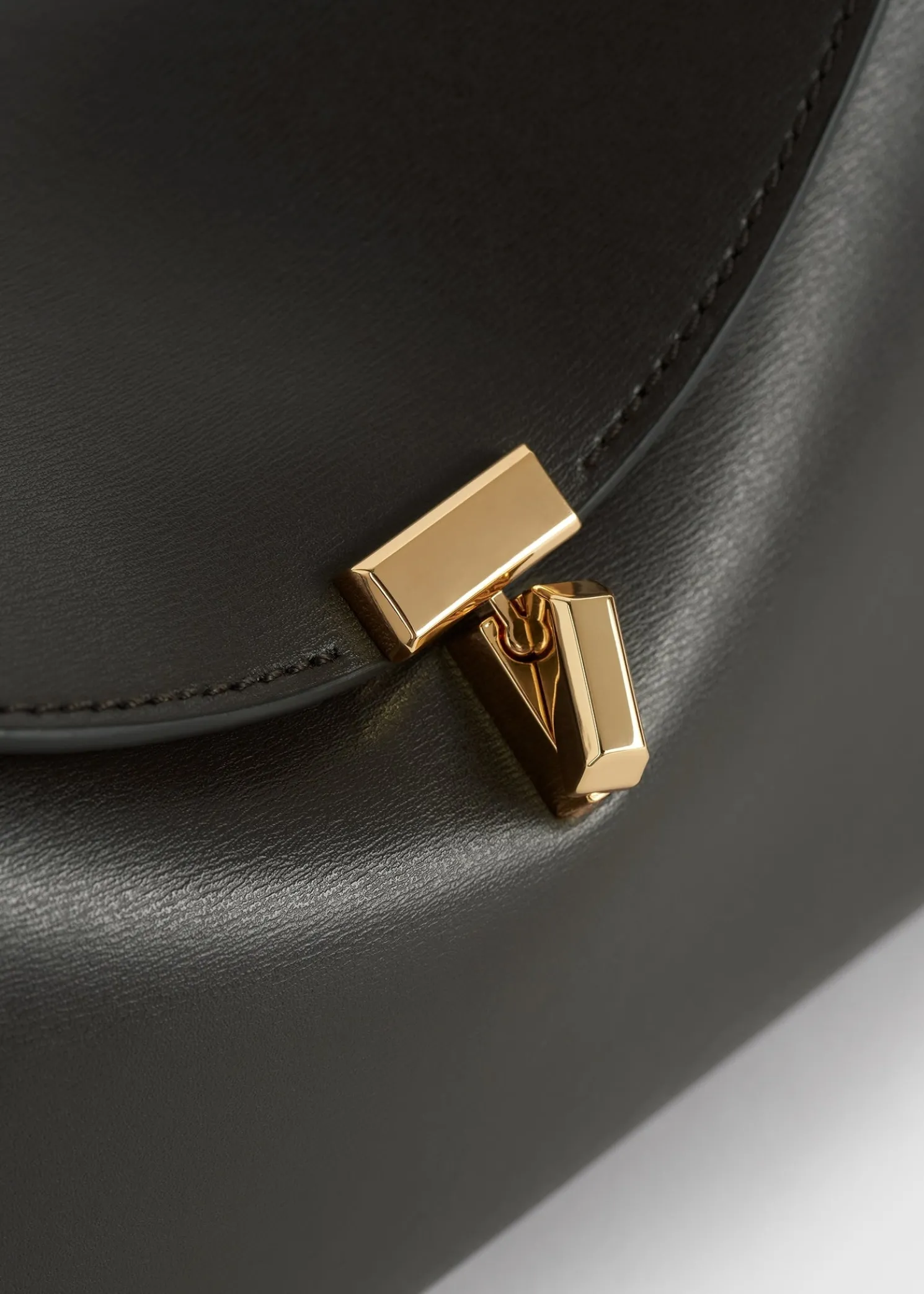 T-Lock leather clutch bark