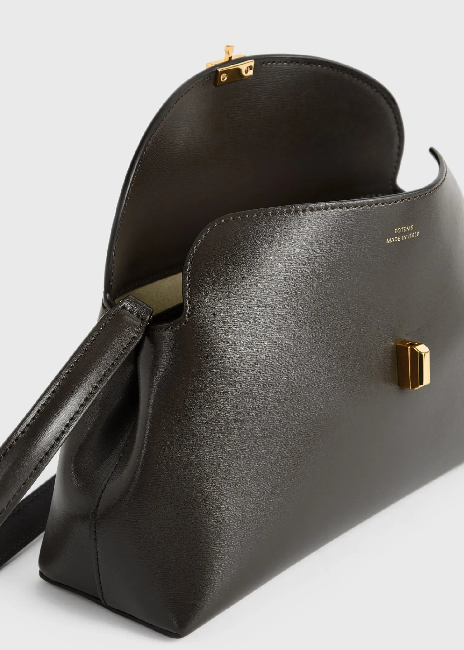 T-Lock leather clutch bark