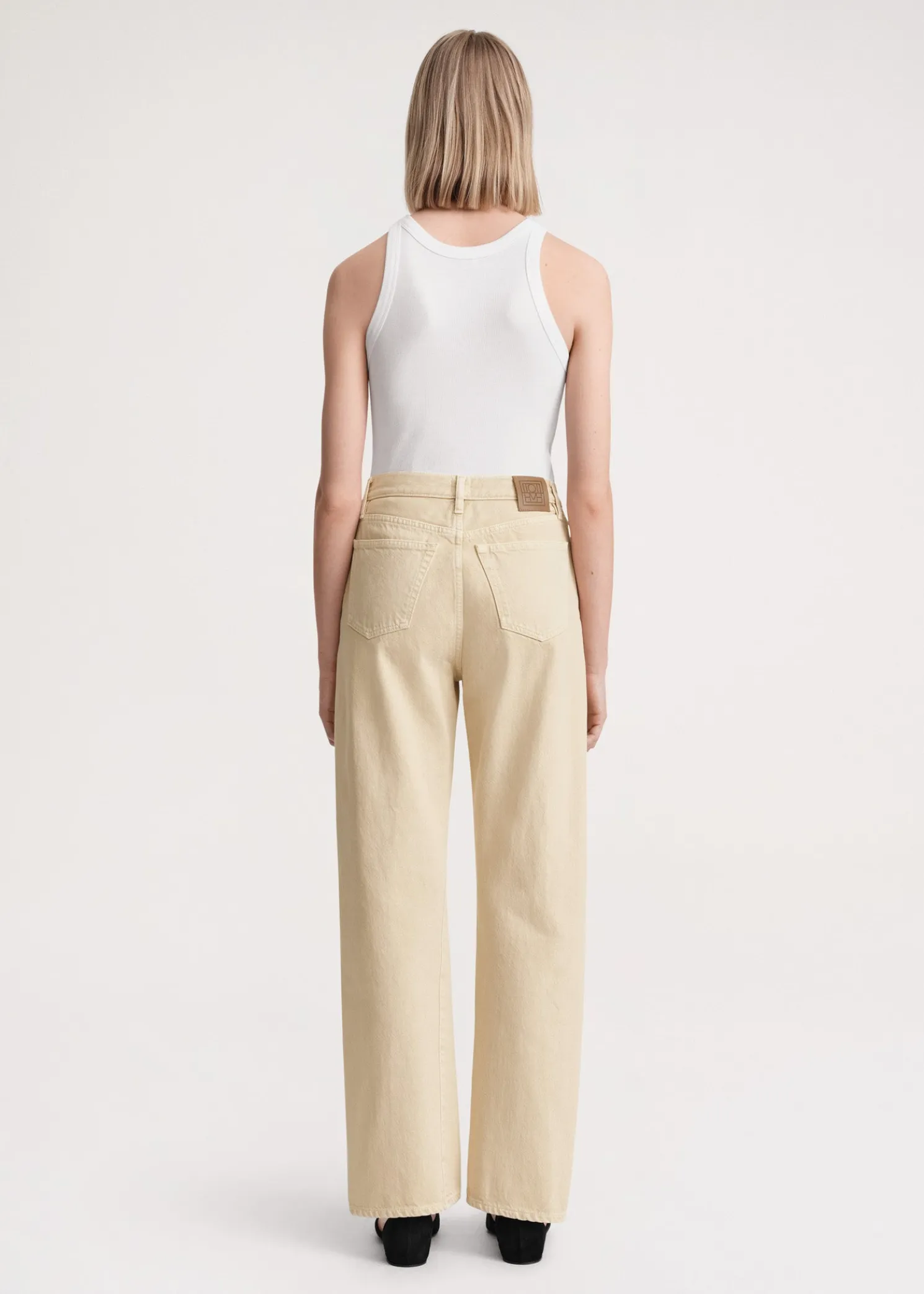 Twisted seam denim full length washed beige