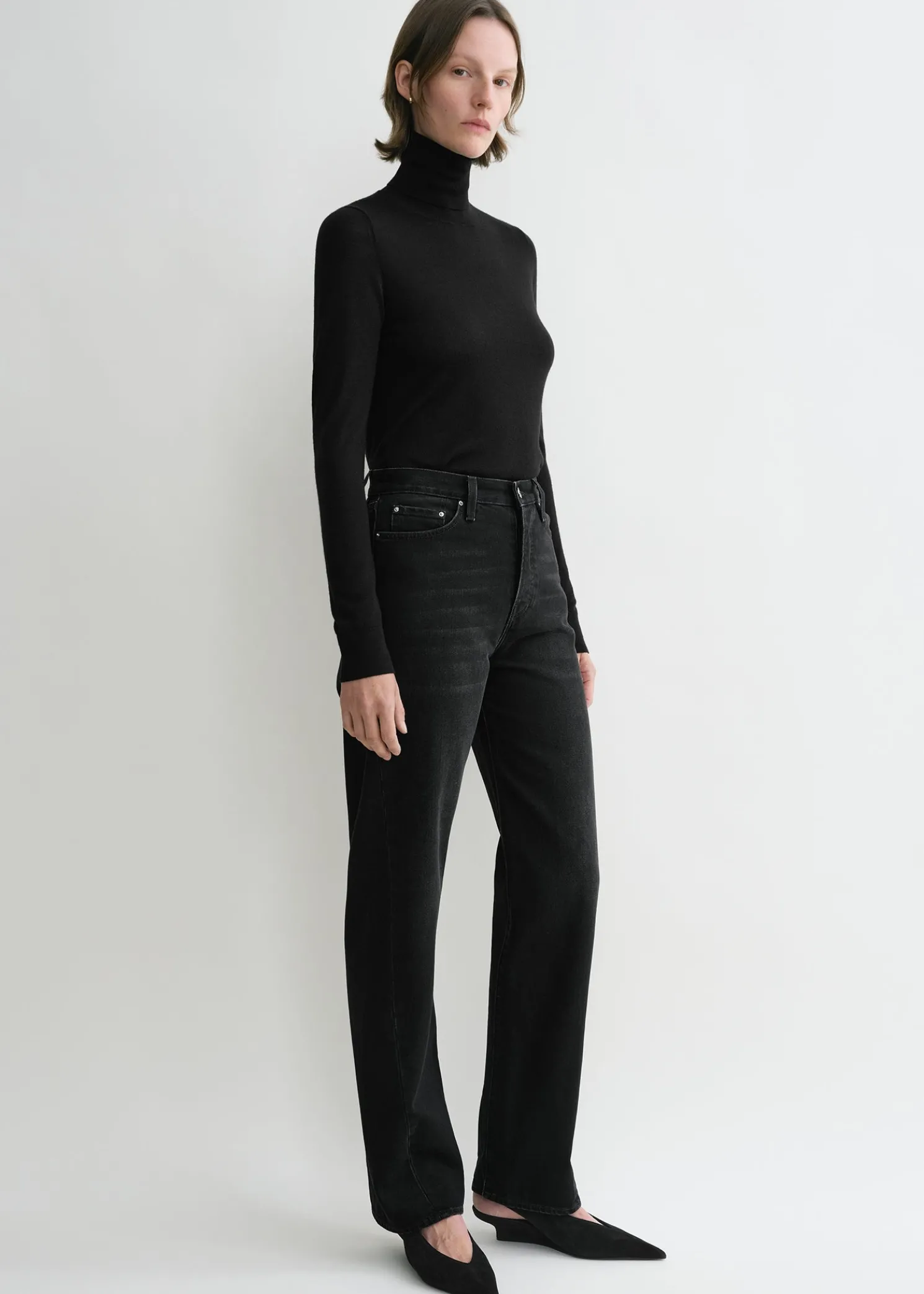 Twisted seam denim full length faded black