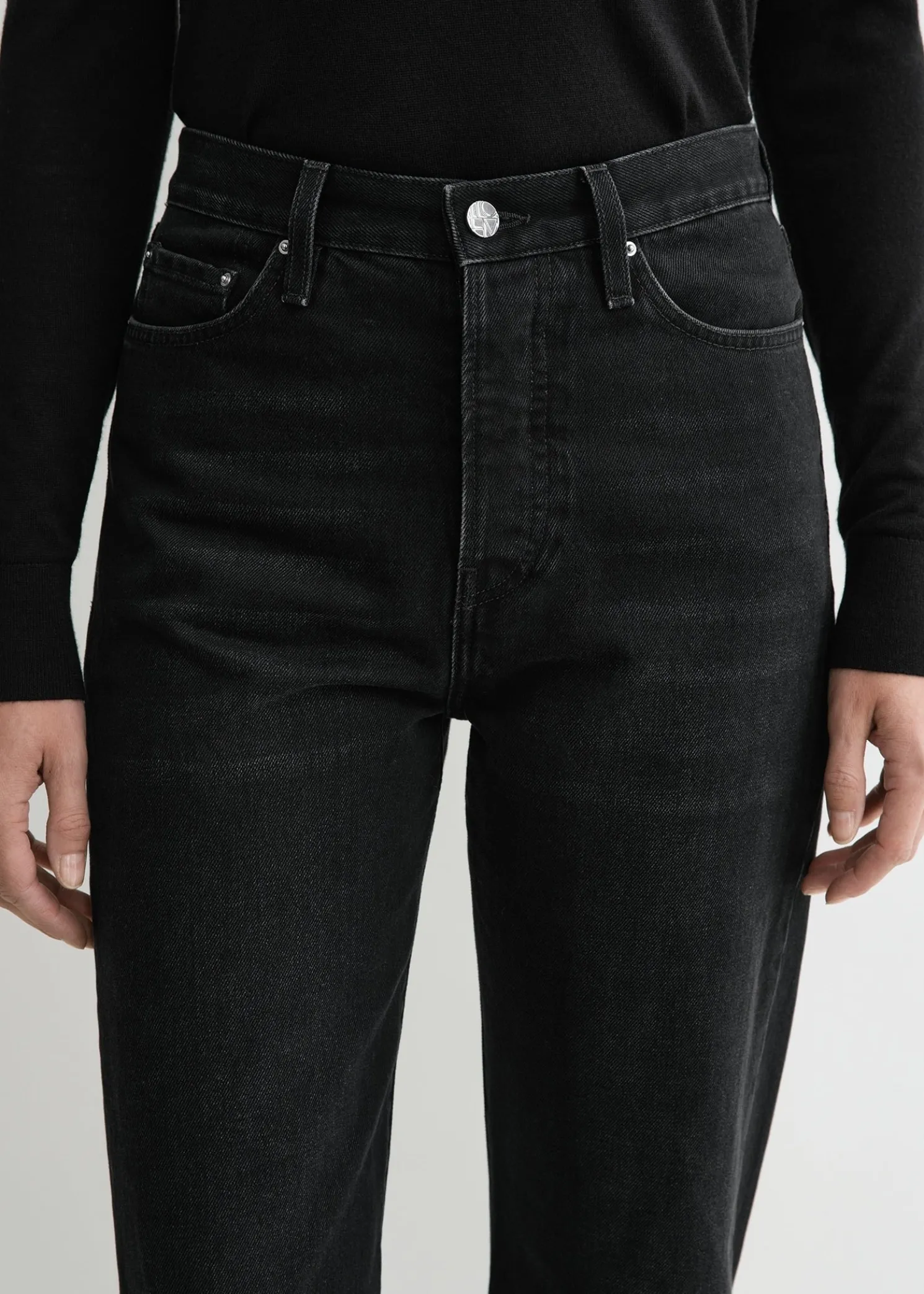 Twisted seam denim full length faded black