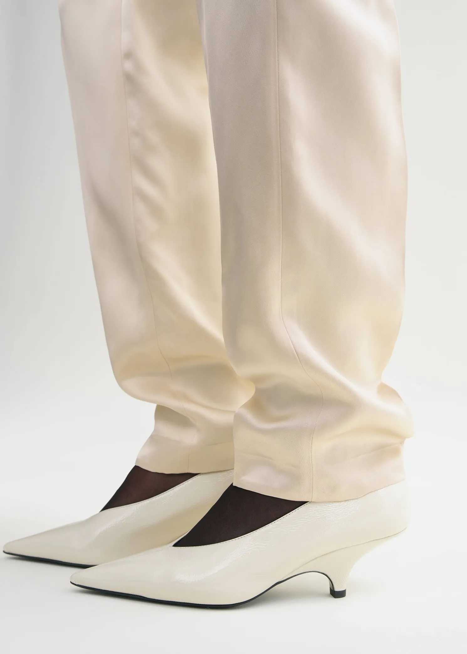 Wedge-heel Naplack pumps bleached sand