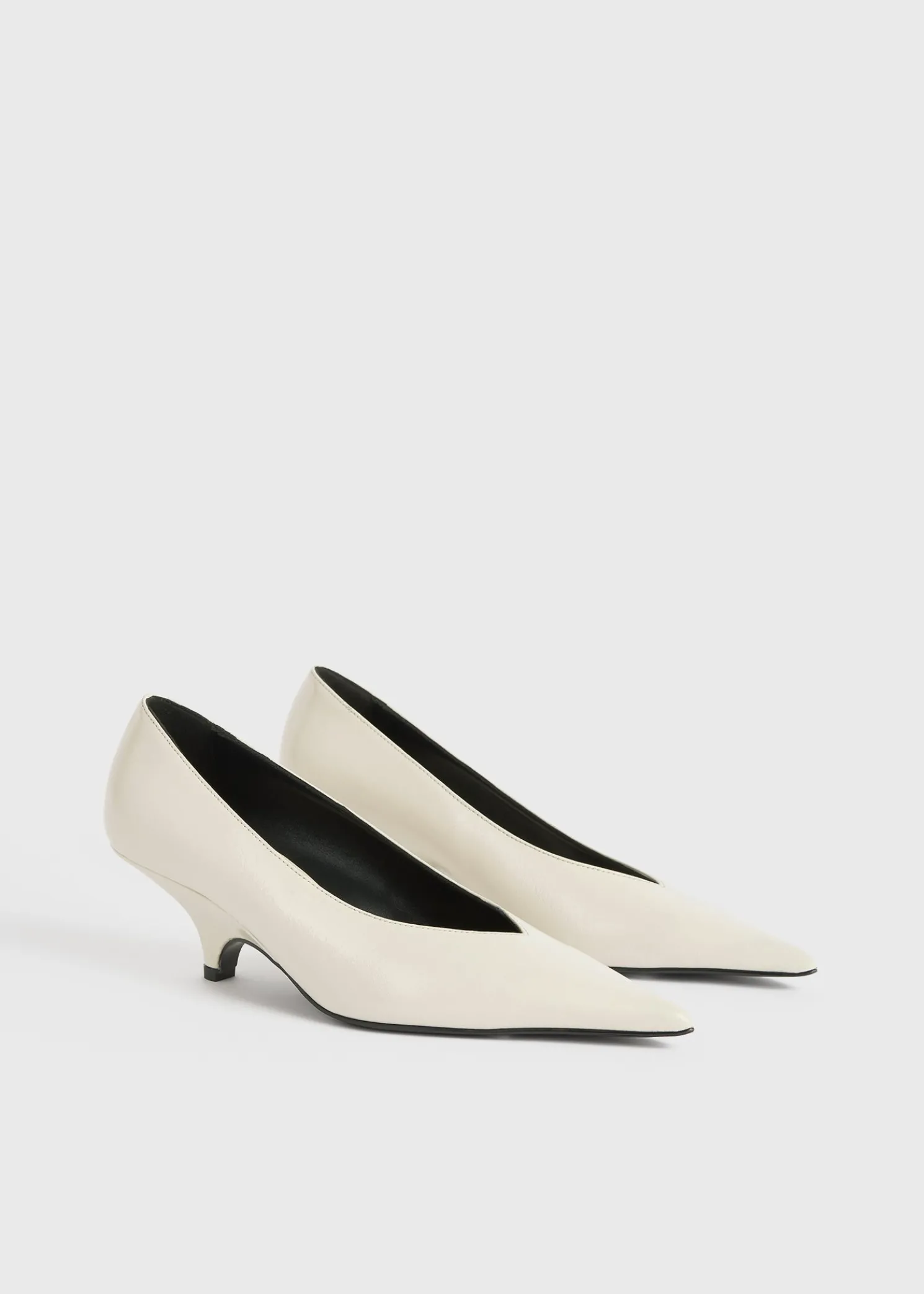 Wedge-heel Naplack pumps bleached sand
